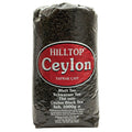 A large, clear plastic bag (1000g) of Hilltop Ceylon Black Leaf Tea (Yaprak Çayı / Blatt Tee) with a prominent red and black oval label.