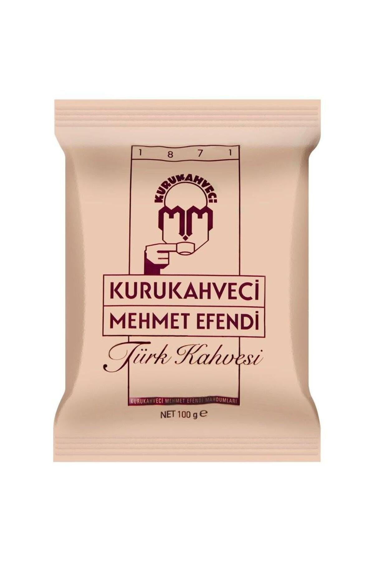 A 100g retail package of Kurukahveci Mehmet Efendi fine ground Turkish Coffee (Türk Kahvesi) in the classic pink and maroon wrapper.